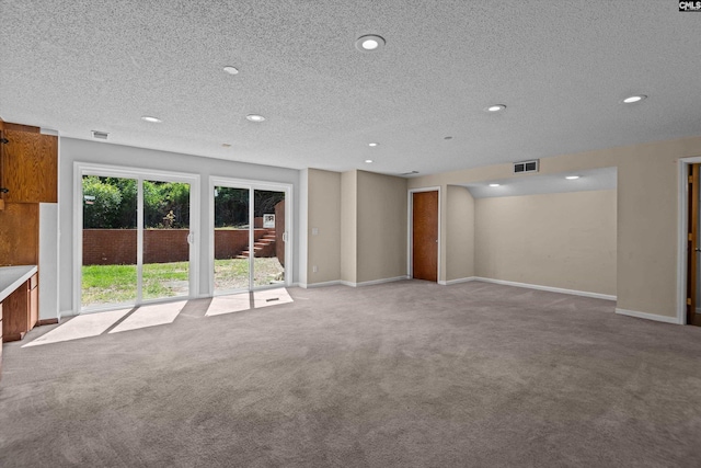 3040 Barnes Springs Rd, Columbia, SC 29204 - unfurnished living room with carpet flooring, recessed lighting, a textured ceiling, and baseboards