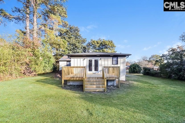 1527 Burnside Ave, Columbia, SC 29209 - rear view of house featuring a wooden deck, a yard, board and batten siding, and french doors