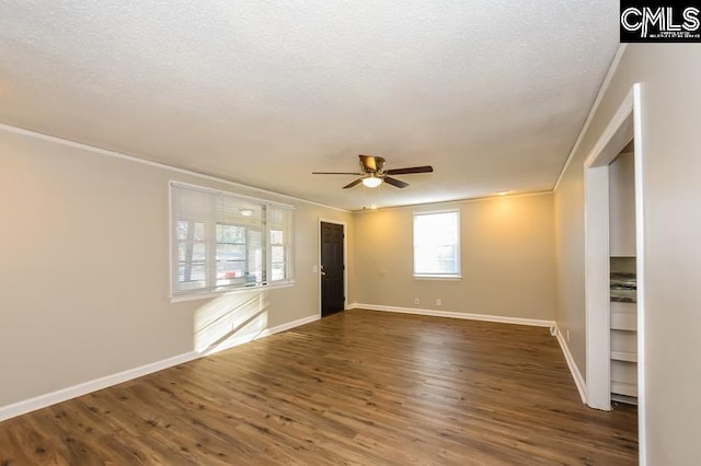 1527 Burnside Ave, Columbia, SC 29209 - empty room with ornamental molding, baseboards, ceiling fan, wood finished floors, and a textured ceiling