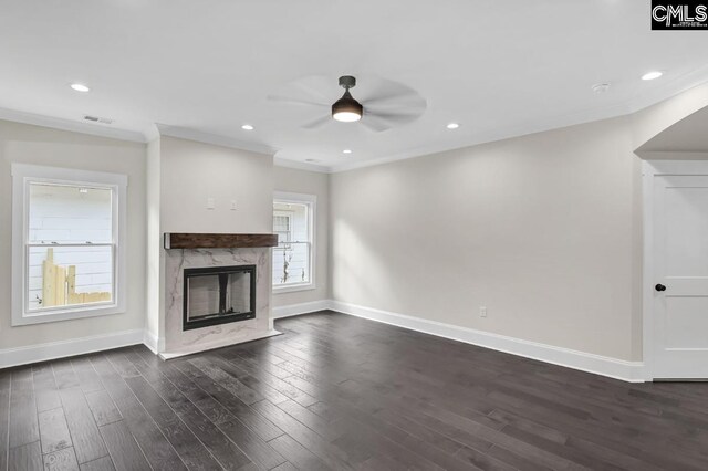 1409 Woodrow St, Columbia, SC 29205 - unfurnished living room with a fireplace, dark wood-style flooring, baseboards, a ceiling fan, and crown molding