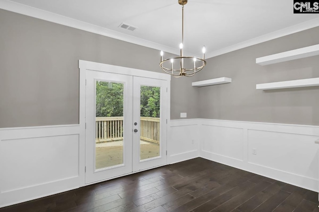 1409 Woodrow St, Columbia, SC 29205 - unfurnished dining area with french doors, a wainscoted wall, crown molding, a chandelier, and dark wood-style floors