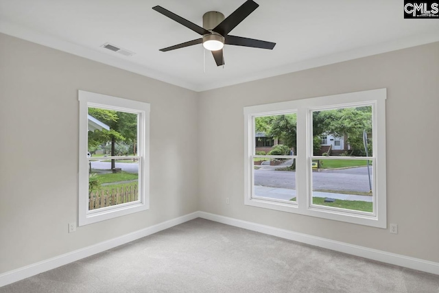 1409 Woodrow St, Columbia, SC 29205 - empty room with baseboards, ceiling fan, and light carpet