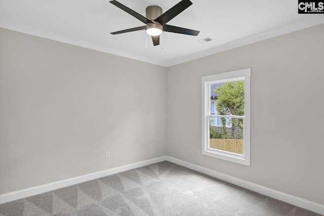 1409 Woodrow St, Columbia, SC 29205 - carpeted empty room featuring baseboards, a ceiling fan, and crown molding