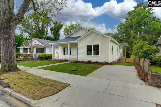 1409 Woodrow St, Columbia, SC 29205 - view of front of home with driveway and a porch