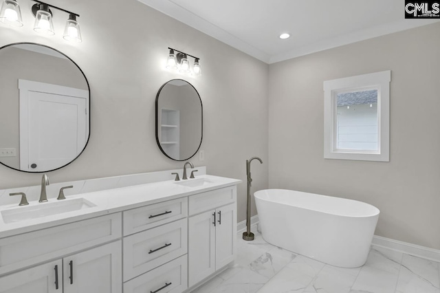 1409 Woodrow St, Columbia, SC 29205 - bathroom with baseboards, marble look tiles, a freestanding bath, double vanity, and recessed lighting