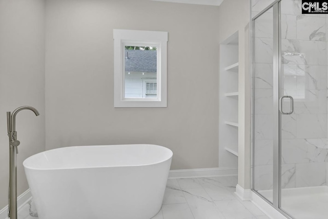 1409 Woodrow St, Columbia, SC 29205 - bathroom with marble finish floors, a shower stall, baseboards, and a soaking tub