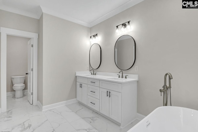 1409 Woodrow St, Columbia, SC 29205 - bathroom featuring marble finish flooring, double vanity, a freestanding tub, toilet, and ornamental molding