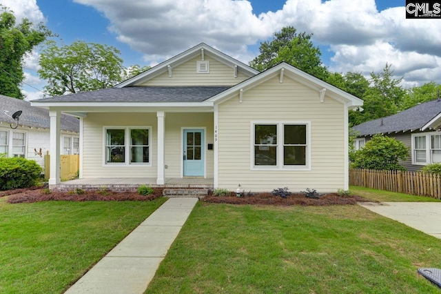 1409 Woodrow St, Columbia, SC 29205 - bungalow featuring covered porch and roof with shingles