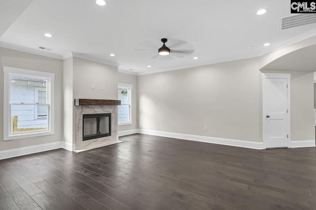 1409 Woodrow St, Columbia, SC 29205 - unfurnished living room with baseboards, ceiling fan, dark wood finished floors, a fireplace, and ornamental molding