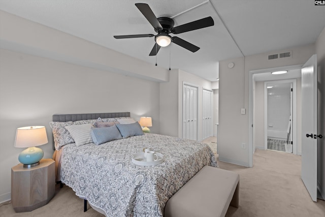 1825 Saint Julian Pl Unit 4E, Columbia, SC 29204 - bedroom with light carpet, a closet, baseboards, and ceiling fan