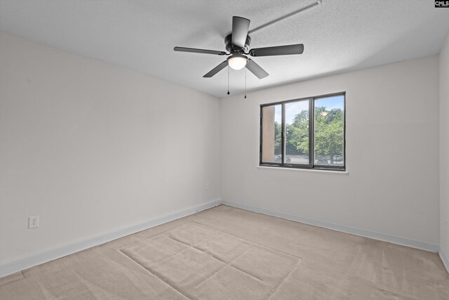 1825 Saint Julian Pl Unit 4E, Columbia, SC 29204 - unfurnished room featuring light colored carpet, ceiling fan, and baseboards