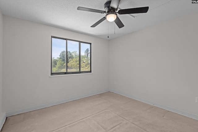 1825 Saint Julian Pl Unit 4E, Columbia, SC 29204 - spare room with ceiling fan, baseboards, a textured ceiling, and light carpet