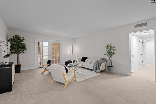 1825 Saint Julian Pl Unit 4E, Columbia, SC 29204 - living room with light carpet and baseboards