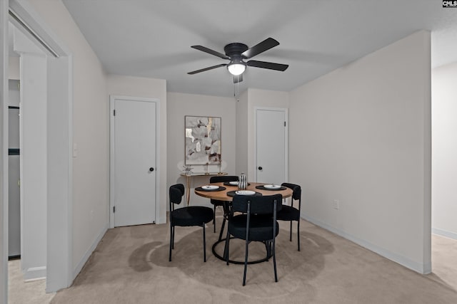 1825 Saint Julian Pl Unit 4E, Columbia, SC 29204 - dining space with ceiling fan, light colored carpet, and baseboards