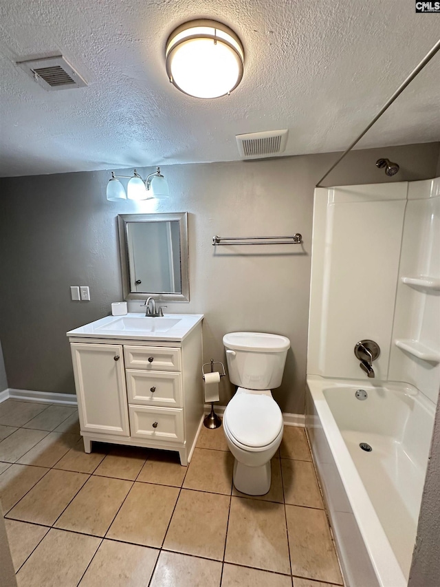 1201 Old Manor Rd, Columbia, SC 29210 - bathroom featuring tile patterned floors, a textured ceiling, vanity, toilet, and baseboards