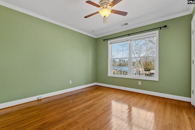 316 Smallwood Dr, Chapin, SC 29036 - unfurnished room featuring baseboards, hardwood / wood-style floors, a ceiling fan, and ornamental molding