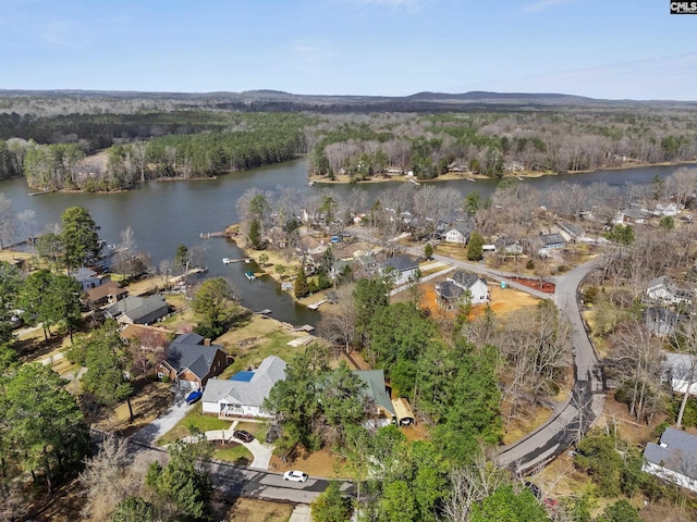 316 Smallwood Dr, Chapin, SC 29036 - aerial view of property's location featuring a large body of water, a heavily wooded area, and nearby suburban area