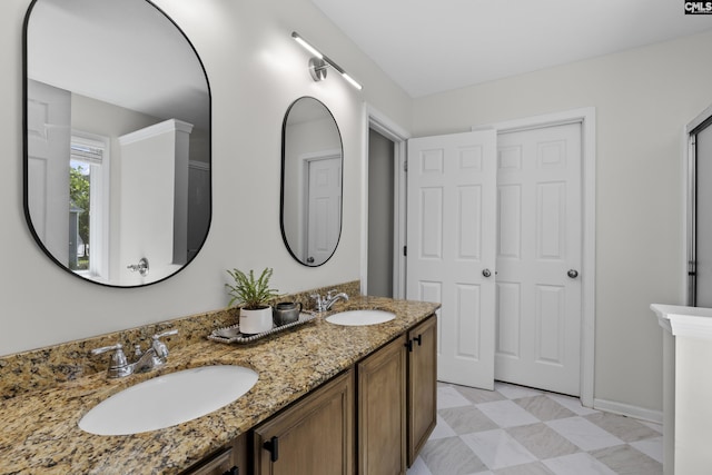 bathroom with double vanity