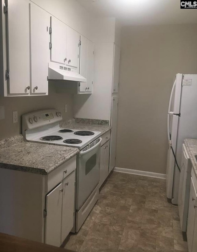 321 Cambout St, Columbia, SC 29210 - kitchen with under cabinet range hood, white appliances, white cabinetry, light countertops, and baseboards