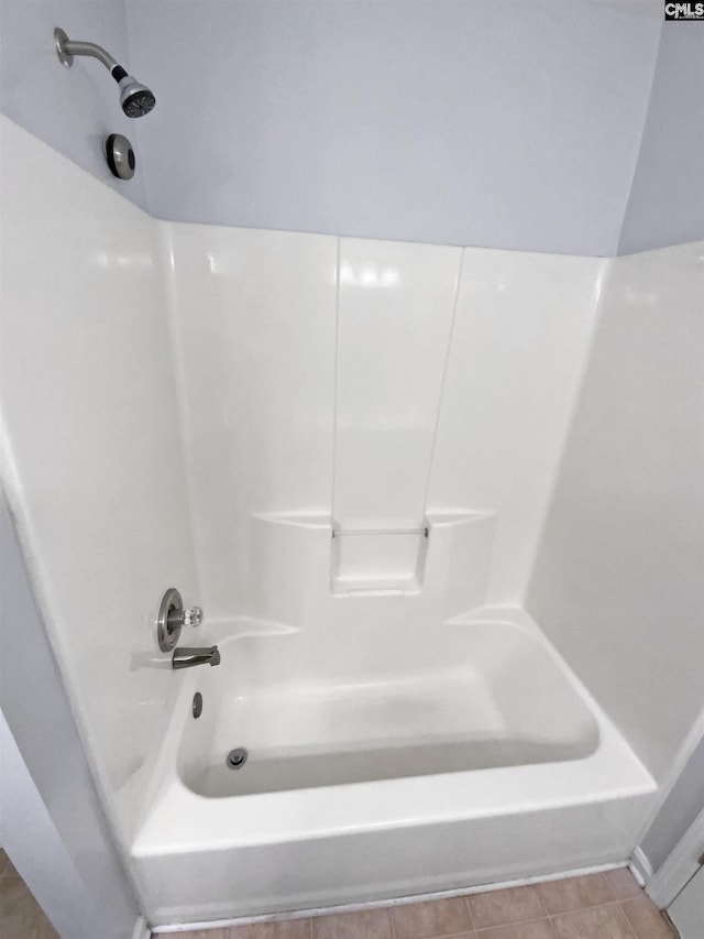 full bath featuring bathing tub / shower combination
