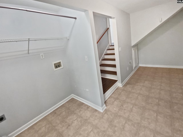 washroom featuring electric dryer hookup, hookup for a washing machine, and baseboards