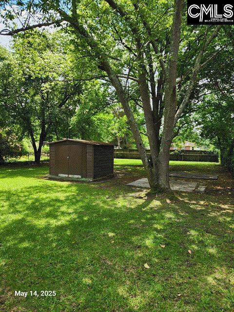 1128 Omega Dr, Columbia, SC 29223 - view of yard with an outdoor structure and a storage unit