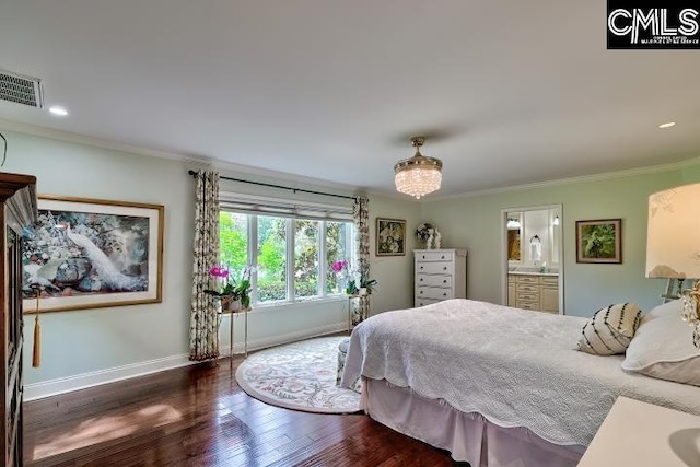 bedroom featuring baseboards, ornamental molding, wood finished floors, ensuite bath, and recessed lighting