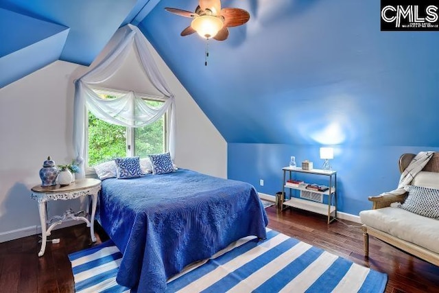 bedroom with wood finished floors, baseboards, vaulted ceiling, and a ceiling fan