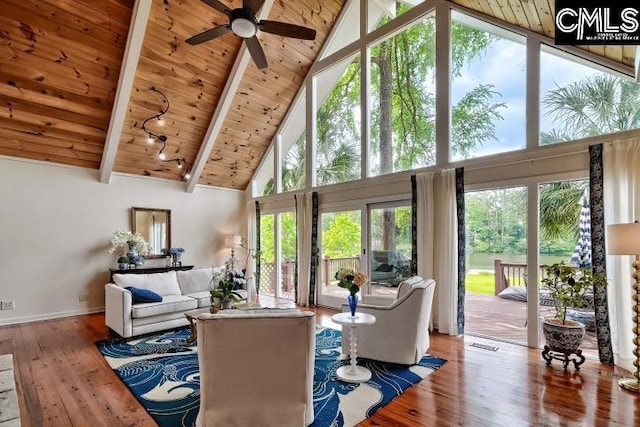 living room featuring wooden ceiling, high vaulted ceiling, hardwood / wood-style floors, a ceiling fan, and beam ceiling