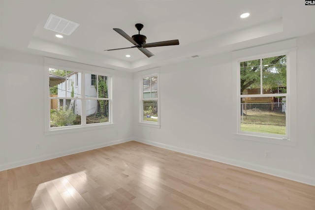 1020 W Confederate Ave, Columbia, SC 29201 - unfurnished room with a raised ceiling, light wood-style flooring, baseboards, recessed lighting, and ceiling fan