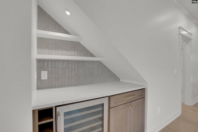 1020 W Confederate Ave, Columbia, SC 29201 - indoor dry bar featuring beverage cooler, tasteful backsplash, and light wood-type flooring