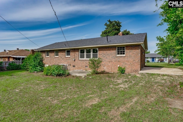 3901 Overdale Dr, Columbia, SC 29223 - back of house featuring brick siding and a chimney
