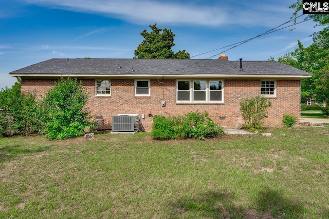3901 Overdale Dr, Columbia, SC 29223 - back of house with central AC, crawl space, brick siding, and a lawn