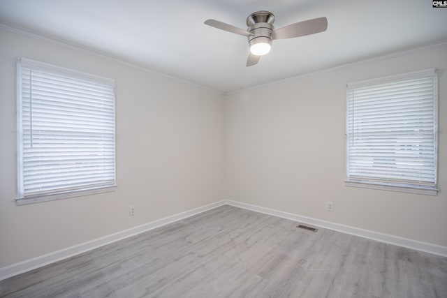 969 Boulevard Rd, Sumter, SC 29153 - unfurnished room with light wood finished floors, a ceiling fan, ornamental molding, and baseboards