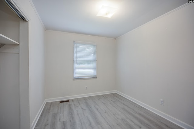 969 Boulevard Rd, Sumter, SC 29153 - empty room with wood finished floors, crown molding, and baseboards