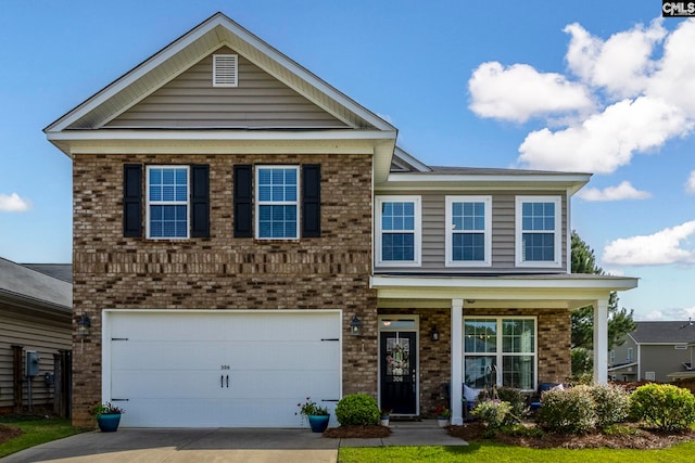 view of front of home featuring brick siding, driveway, and an attached garage
