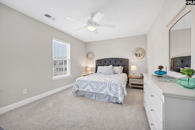 bedroom with light carpet, baseboards, and ceiling fan