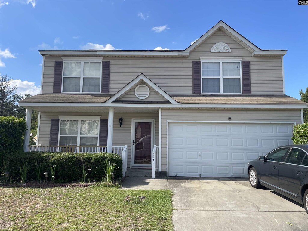 445 Dukes Hill Rd, Columbia, SC 29223 - traditional home with a garage, concrete driveway, covered porch, and a shingled roof