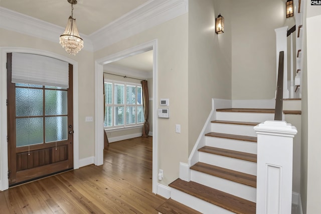 177 Preserve Ln, Columbia, SC 29209 - foyer entrance featuring hardwood / wood-style flooring, stairway, a chandelier, crown molding, and baseboards