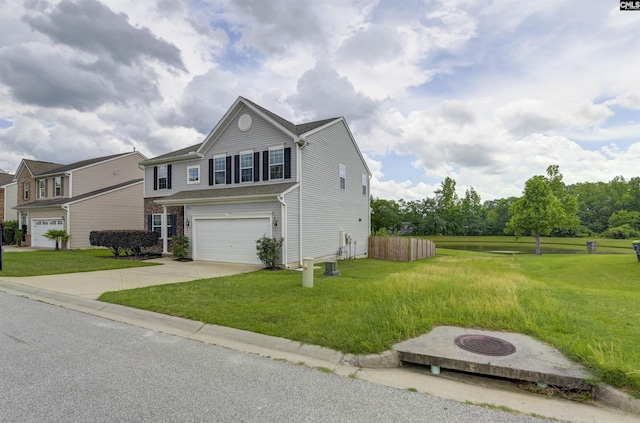 315 Merus Dr, Lexington, SC 29072 - view of front of home with a fire pit, an attached garage, and driveway