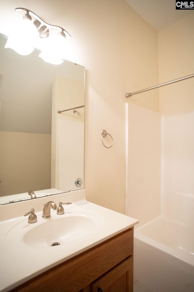 full bathroom featuring vanity and bathing tub / shower combination