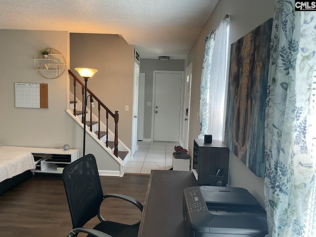 office space featuring wood finished floors and baseboards