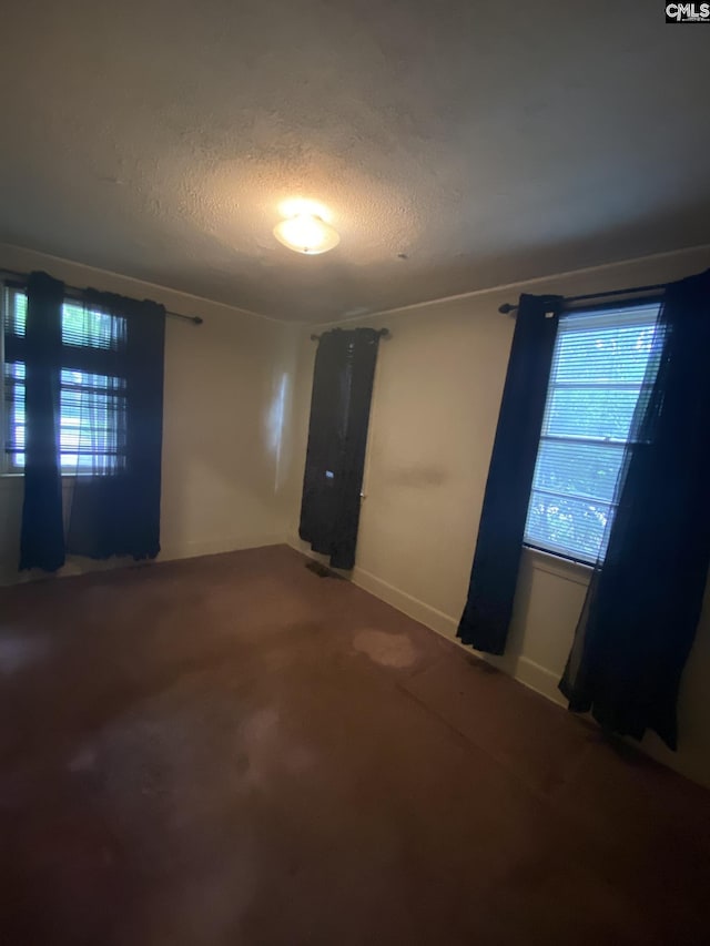 170 Brookland Cir, Columbia, SC 29204 - spare room featuring a textured ceiling and carpet flooring