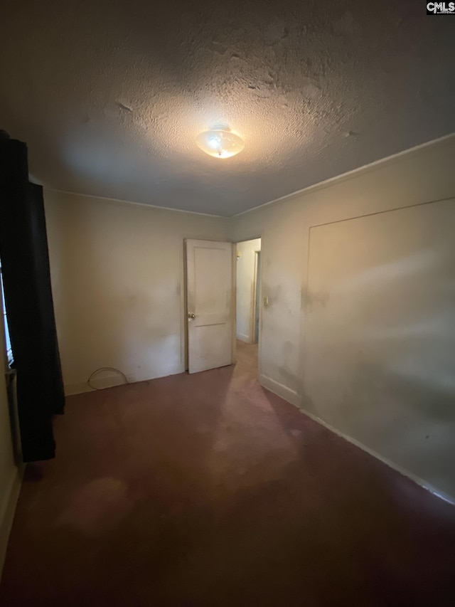 170 Brookland Cir, Columbia, SC 29204 - empty room featuring a textured ceiling, light colored carpet, and baseboards