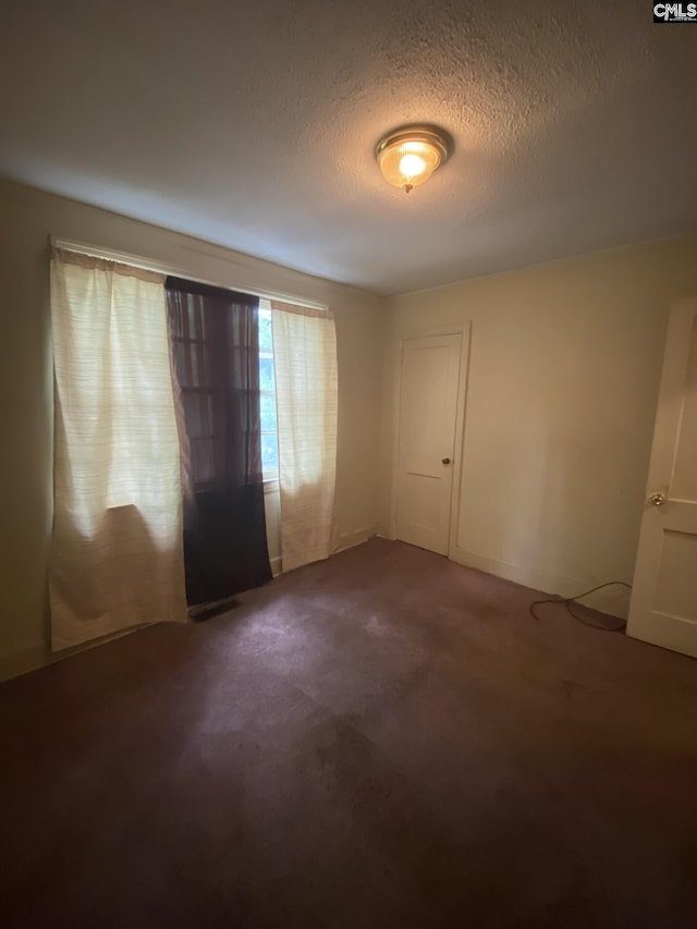 170 Brookland Cir, Columbia, SC 29204 - carpeted empty room featuring a textured ceiling