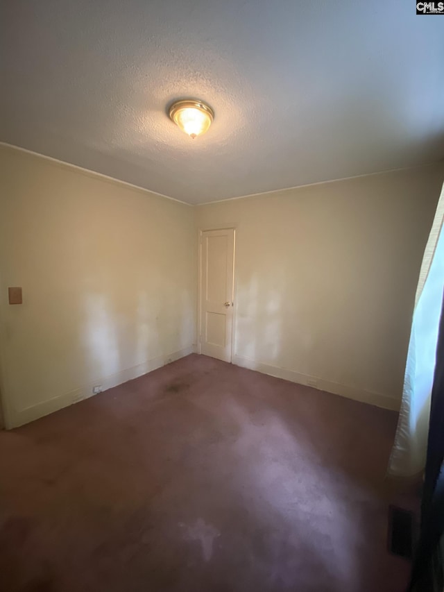 170 Brookland Cir, Columbia, SC 29204 - carpeted spare room featuring baseboards and a textured ceiling