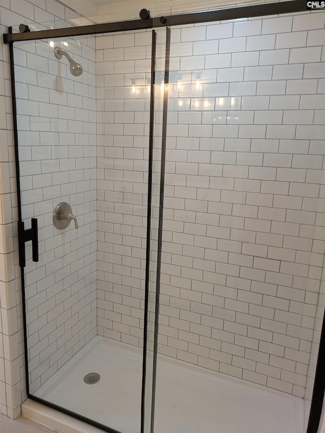 full bath featuring a stall shower