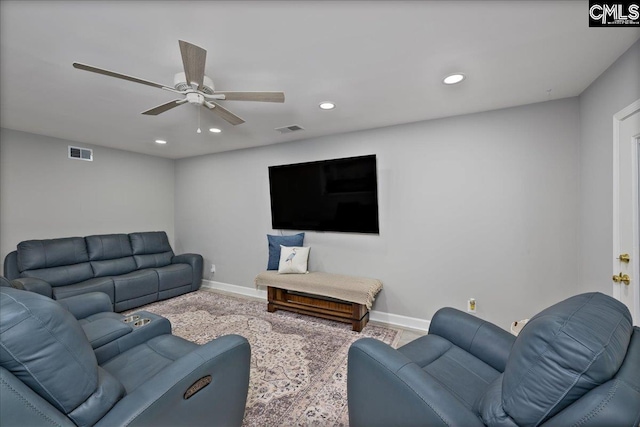 living room with ceiling fan, baseboards, and recessed lighting