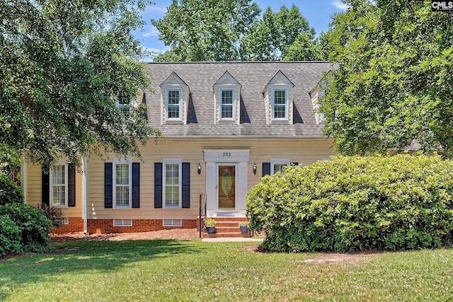 cape cod home with a front lawn and crawl space
