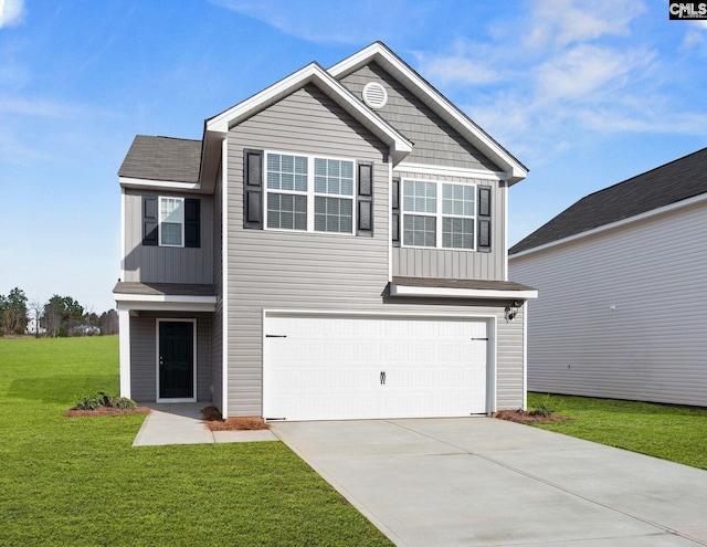 1013 Peaceful Fawn Dr, Elgin, SC 29045 - view of front of property with a garage, board and batten siding, concrete driveway, and a front lawn